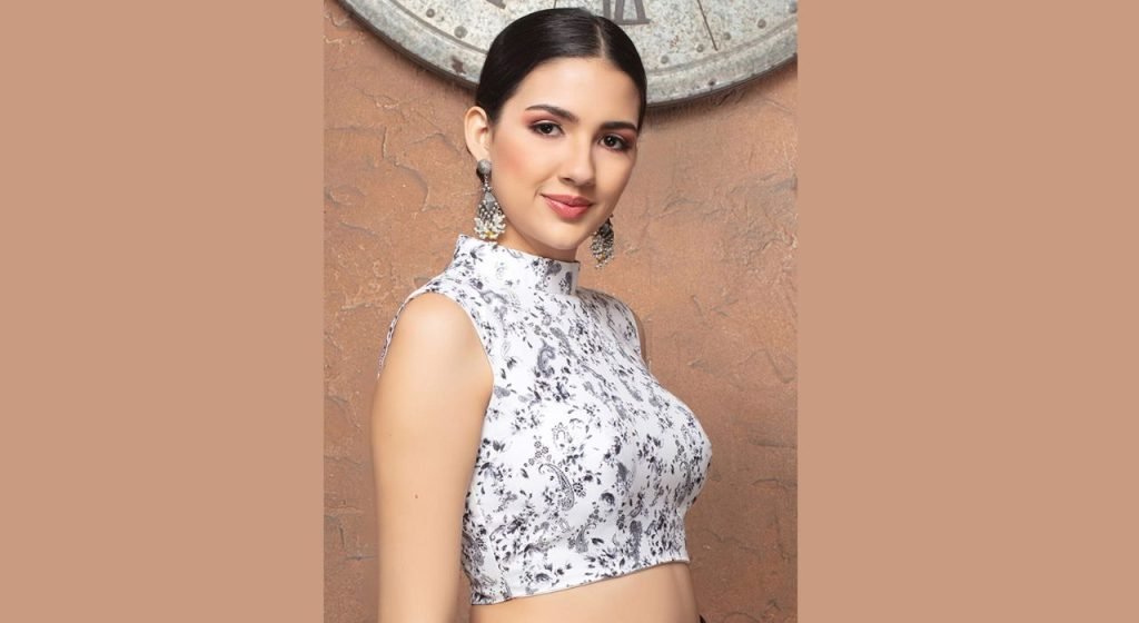 A girl looking beautiful in High-Neck Blouse