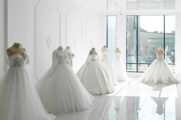 6 wedding gowns on dummy after competing preservation and ready to packed.