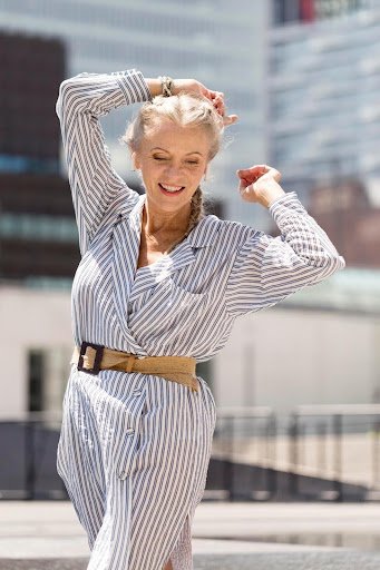 A woman over 40 in fashion cloths.