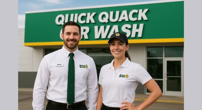 Quick Quack Car Wash dress code — male and female employees wearing branded uniforms with green shirts and caps outside the car wash facility.